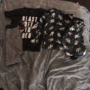 Bundle of Carter’s size 6 kids astronaut pajamas